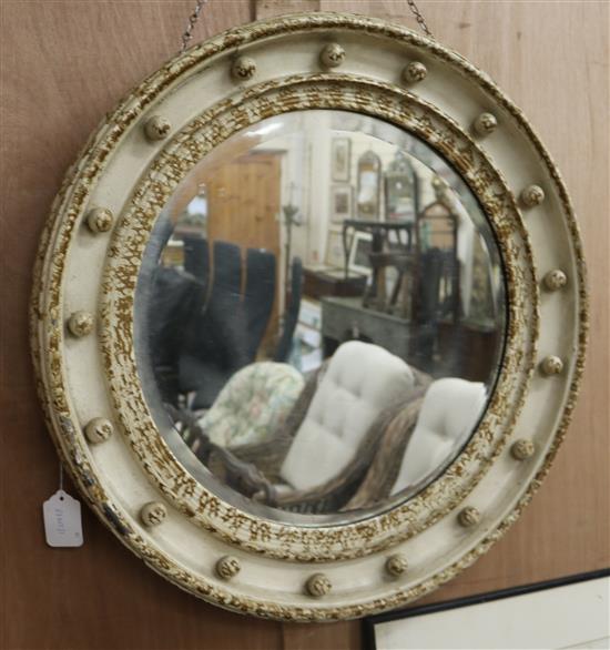 A painted circular wall mirror and a pub mirror circular W.62cm pub W.51cm